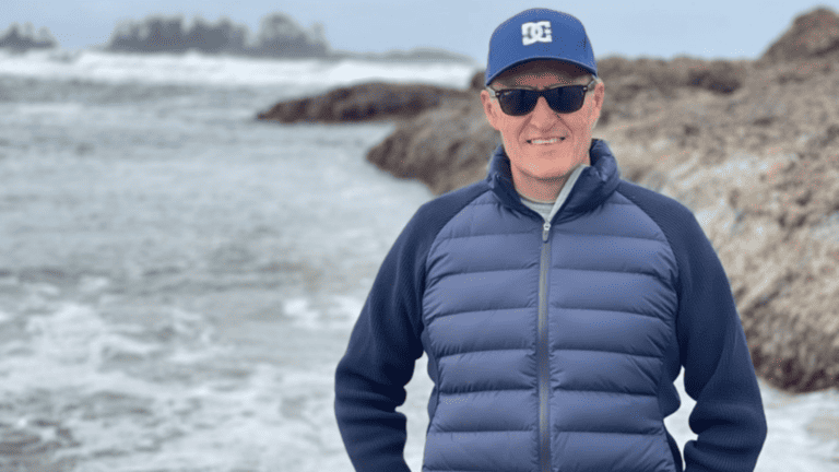 President Mike Mack standing by the ocean, reflecting on why executive coaching matters for leaders.