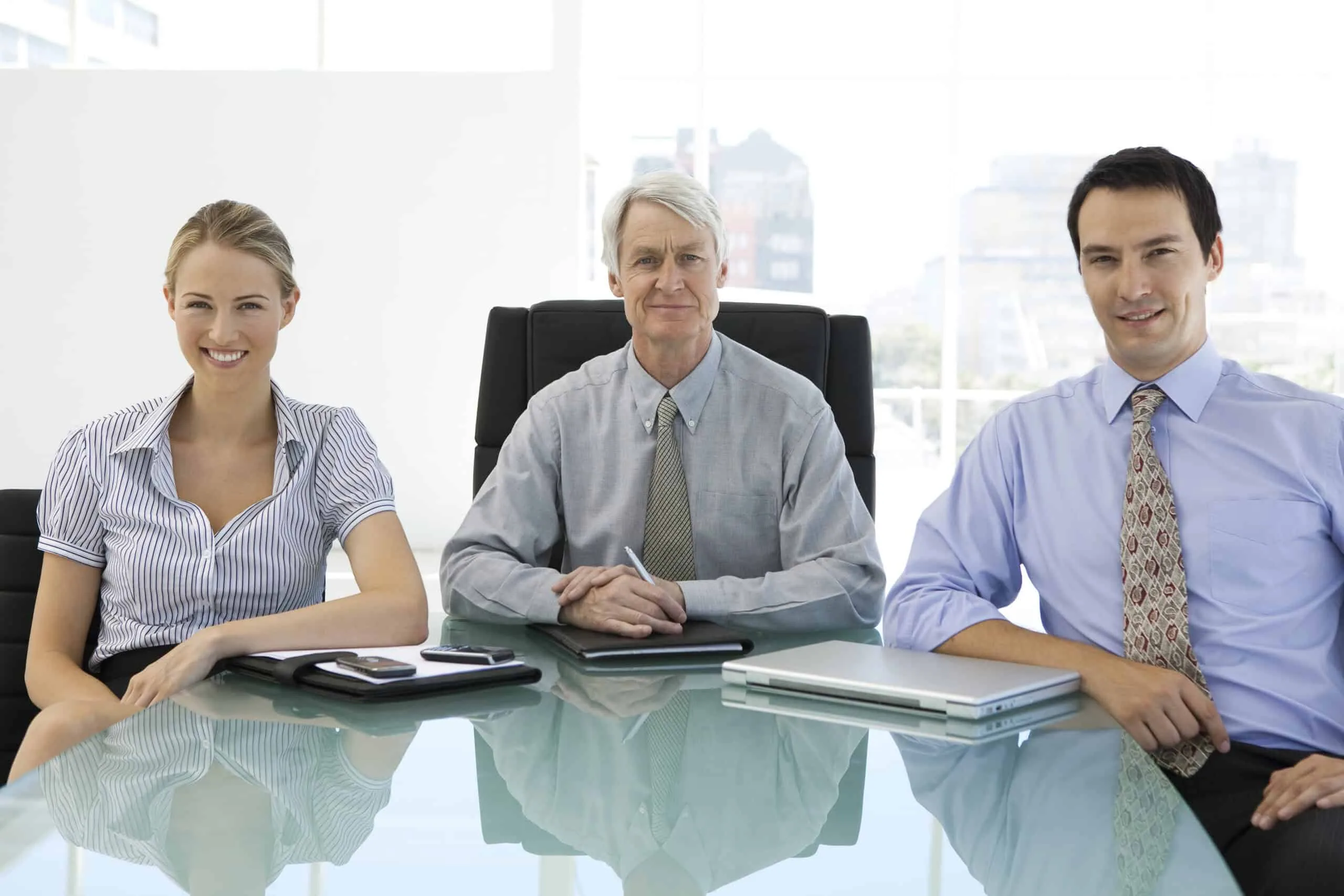 Succession planning and strategic planning matter to your team, in this picture a team with an older man plans for the future.